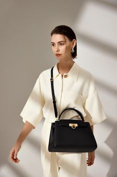 Elegant Daily Satchel With Turn-lock Closure, Elegant Satchel With Turn-lock Closure For Daily Use, Elegant Workwear Bags With Turn-lock Closure, Elegant Shoulder Bag With Turn-lock For Work, Elegant Shoulder Bag With Turn-lock Closure For Work, Timeless Office Satchel With Turn-lock Closure, High-end Shoulder Bag With Turn-lock Closure For Office, Chic Office Satchel With Turn-lock Closure, High-end Office Shoulder Bag With Turn-lock Closure