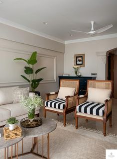 a living room with two chairs and a coffee table