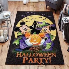 mickey mouse and minnie mouse halloween party door mat with pumpkins on it in front of a