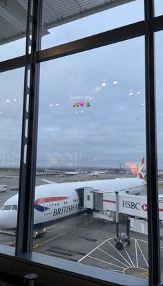 an airplane is parked at the airport terminal