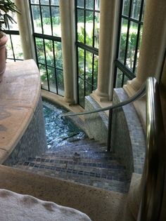 an image of a pool in the middle of stairs