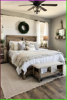 a bedroom with a bed, dresser and ceiling fan in the corner next to a window