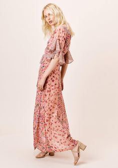 Add some flower power to your wardrobe in our effortlessly elegant and ethereal maxi wrap dress in a beautiful mixed floral print. Featuring flattering ruffle sleeves and a waist defining belt. The perfect boho dress for your next special occasion! Ruffle sleeve Maxi length V-neckline Tie waist Partially sheer Model is 5'9, wearing a size M.Style: I-71537WL-QQQ-MP Dress Flutter Sleeves, Boho Floral Maxi Dress, Minimal Wardrobe, Floral Wrap Dress, Boho Fall, Yes To The Dress, Floral Wraps, Wrap Dress Floral, Ruffle Sleeves