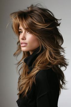 This long-layered shaggy mullet hairstyle for women is enhanced with caramel brown highlights. The warm highlights add dimension to the cut, creating a dynamic and vibrant look that’s perfect for adding a touch of brightness to your style. Layered Shag, Rambut Brunette, Long Shag Haircut, Arabian Stallions, Shaggy Long Hair, Layered Haircuts For Medium Hair, Shag Haircuts, Hairstyles For Layered Hair, Everyday Clothing