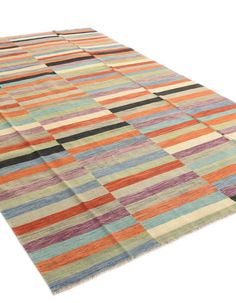 a multicolored rug on white background