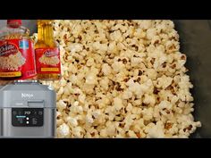 the popcorn is being cooked and ready to be put into the oven with oil, salt, and seasoning