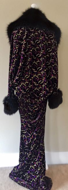 *Available for immediate shipping* Handmade,velvet cocoon robe, faux fur collar and cuffs. Old Hollywood glamour for the modern Diva , this gorgeous robe is made from a beautiful black velvet embossed with glitter pattern and a luxuriant generous midnite black faux fur trim on the collar and cuffs . Hook and eye front closure. For the diva who knows how to make an entrance! Fits up to size 18 and super flattering on all bodies! Party Fur Coat With Feather Trim, Party Fur Coat With Faux Fur Trim, Glamorous Long Sleeve Fur Coat For Party, Fitted Party Fur Coat With Faux Fur Lining, Fitted Fur Coat With Faux Fur Lining For Party, Fitted Fur Coat With Faux Fur Trim For Party, Elegant Fitted Fur Coat For Party, Fitted Fur Coat With Feather Trim For Party, Elegant Party Fur Coat With Feather Trim