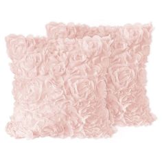 two pillows with pink flowers on them