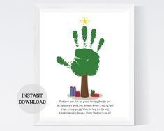 a hand print with an image of a tree and presents under it on a white background