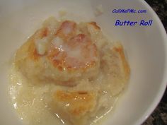 some food is in a white bowl on a counter top with the words butter roll written below it