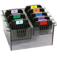 the multicolored plastic trays are stacked on top of each other in an acrylic holder