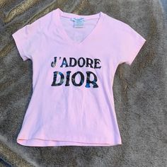 Like New Authentic Vintage Dior T Shirt Size M (I’m Usually A Small And This Fits Perfect) It’s Very Stretchy But Still Form Fitting ! Thick Material That Doesn’t Pill, Worn Once. Like New Condition Dior T Shirt, Dior Shirt, Christian Dior, Vintage Dior, Like New, Black Pink, Top Blouse, Dior, Womens Tops