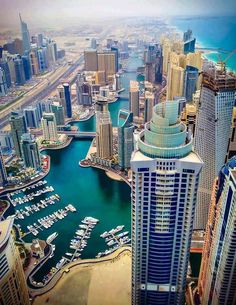 an aerial view of the city and its marina in abu, united arab emirates region