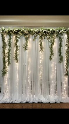 Dec 142018This Pin was discovered by Dayana TanevaDiscover (and saveyour own Pins on Pinterest Vine Wedding Backdrop, White Curtain Backdrop With Greenery, Inside Wedding Backdrop Ideas, Rectangle Wedding Backdrop, Country Sheek Wedding Decor, How To Hang Backdrop On Wall, Flower Wall Sweetheart Table, Wedding Chandelier Decor, Quince Main Table Ideas Green