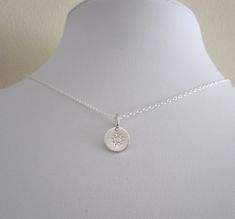 "925 sterling silver small SUN PRINT stamped coin disc charm with chain necklace. Celestial charm layering necklace. This delicate small charm necklace is sweet and minimalistic and will make a great present for your mom, sis, friend, bridesmaid, colleague or yourself. It is suitable for any occasion. The necklace is 1.3mm fine sterling silver cable chain, 925 stamped. Please choose the length from the menu. The charm is 9mm (0.35\") in diameter and is made of solid sterling silver. The necklace Celestial Necklace, Small Charms, Layering Necklace, Minimalist Necklace, Silver Pieces, Sterling Silver Earrings Studs, Gold Filled Jewelry, Sterling Silver Charm, Sterling Silver Necklace