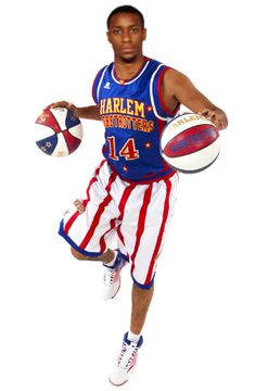 a basketball player in an american flag uniform is holding a ball and jumping into the air