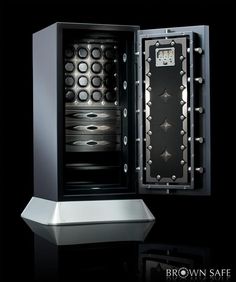 a black and silver safe with its door open