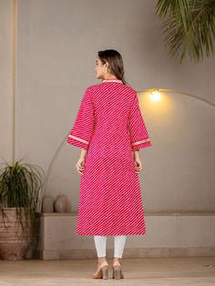 Introducing our, hot pink leheriya print & mirror work detailing a line kurta a vibrant fusion of style and culture. Crafted from cotton fabric, the kurta comes with mandarin collar, 3/4th flared sleeves & calf length can be teamed with leggings & palazzos. Single Piece Fabric: Cotton Color: Hot Pink Neck: Mandarin Collar Sleeve: 3/4th Sleeves Style - A Line Shape with Regular Style Work Done: Leheriya Print & Mirror Work Detailing Length - Calf Length Washing Instructions: Hand Wash Disclaimer: Pink Straight Kurta With Mirror Work, Cotton Lehriya Kurti Designs Latest, Lehriya Kaftan Dress, Pink Lehriya Kurti Designs, Leheriya Print Pattern, A Line Kurta, Mirror Work, Womens Size Chart, Single Piece