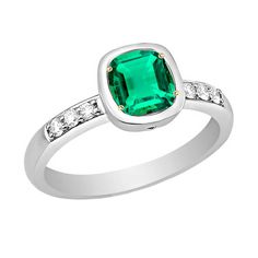 METAL SPECIFICATIONS Two Tone Gold 14K STONE SPECIFICATIONS Stone Name : Green Emerald and Diamond Stone Cut : Cushion and Round Cut Stone Details : There is one cushion cut green emerald stone in the center approx. 2.50 carats (Approx. Size 7 x 7 mm) with approx. 0.50 carats of small round diamonds on the sides. Crafted with natural earth mined stones. Color : Green/F Clarity : VS1 Quality : AAA Total : Approx. 3 Carats RING SPECIFICATIONS Appraised Value : $8,478.00 Size : 6.5 (Can ship in any size) Comes with Certificate Asscher Cut Emerald Ring With Diamond Accents, Green Asscher Cut Ring With Diamond Accents, Cushion Cut Emerald Diamond Ring In White Gold, Green Cushion Cut Diamond Ring For Formal Occasions, Formal Green Rings With Diamond Accents, Green Rings With Diamond Accents For Formal Occasions, Classic Green Emerald Ring With Diamond Accents, Classic Green Emerald Ring With Accent Stones, Green Emerald Ring With Gemstone Accents For Anniversary