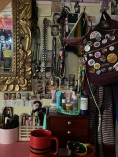 a cluttered desk with various items on it, including a purse and many other things