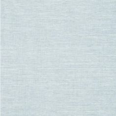 an area rug that is light blue and has stripes on the bottom, with a white background