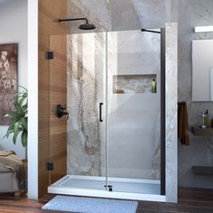 a bathroom scene with focus on the shower and bathtub, along with a rug