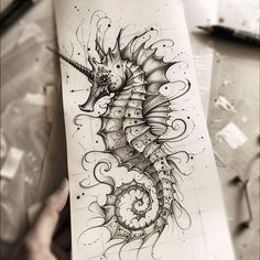 a drawing of a sea horse on a piece of paper with some ink in it