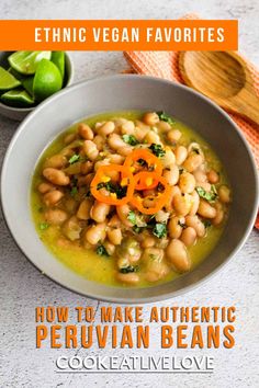 a white bowl filled with beans and broccoli on top of a counter next to a wooden spoon