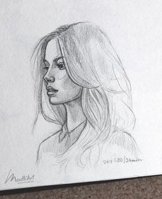 a pencil drawing of a woman's face with long blonde hair and eyes closed