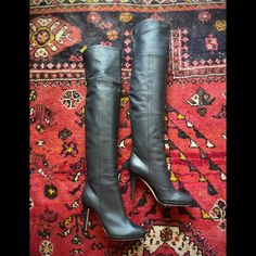 Like New, Authentic Pair Of Jimmy Choo “Gypsy” Fitted Over The Knee Boots. Never Actually Worn (Tried On Briefly Indoors). Near Perfect Condition. Some Marks On Sole From Storage And Trying On. Missing Original Box. Designed By Sandra Choi Grainy Calfskin 4" Covered Heel; 1/2" Platform; 3 1/2" Equiv. Approx. 21” H Over-The-Knee Shaft Split-Back Cuff With Gored Stretch Inset 14” Circumference; Pull-On Style Leather Lining And Insole Leather Sole With Rubber Inset Made In Italy Eu Size 38 (7.5/8 Us) Jimmy Choo Shoes, Over The Knee Boots, Over The Knee, Jimmy Choo, Knee Boots, The Knee, Calf Skin, Original Box, Cuff