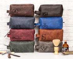 A personalized leather Dopp kit toiletry bag is a fantastic gift choice for men on various occasions. Whether it's for your boyfriend, husband, dad, or a friend going away, or as a birthday gift, this thoughtful present offers style, functionality, and sentimentality. Here are the reasons why a personalized leather Dopp kit makes a great gift: Elegant and Stylish: Leather Dopp kits have a timeless appeal and exude elegance, making them a fashionable accessory for any man. Durability and Quality: Personalized Toiletry Bag, Leather Dopp Kit, Mens Toiletry Bag, Travel Cases, Leather Toiletry Bag, Hunting Gifts, Personalized Football, Dopp Kit, Vanity Case