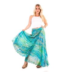 Be unique | Wear art A beautiful and floaty wrap skirt, perfect for both days and nights, with high heels, flat sandals or trainers. Made of 100% rayon - a bio-based soft and breathable fabric. Limited edition. One size, just wrap the skirt around your waist. Can fit a size 6 to 16 UK size, 38/48 EU size, 2/12 US size, 6/16 Australian size, 38/48 Italian size. Comes in five different prints. Designed in London - made with love. Breezy Tiered Maxi Skirt, Breezy Maxi Summer Bottoms, Breezy Maxi Length Summer Bottoms, Breezy Maxi Length Bottoms For Summer, Breezy Flowy Lined Maxi Skirt, Breezy Flowy Maxi Skirt With Lining, Ankle-length Relaxed Lined Skirt, Ankle-length Relaxed Maxi Skirt With Lining, Breezy Relaxed Maxi Skirt With Lined Detail