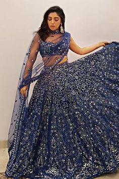 Blue lehenga with foil print, resham and mirror work. Paired with embroidered blouse and dupatta.
Components: 3
Neckline: Sweetheart
Sleeve Length: Sleeveless
Fabric: Net
Color: Blue
Embroidery
Dupatta with embroidered border
Closure:
Blouse: Back hook - Aza Fashions Indian Lifestyle, Diva Dress, Designer Bridal Lehenga, Gaun Fashion, Blue Lehenga, Sisters Dress, Indian Bridal Outfits, Indian Wedding Outfits, Lehenga Designs