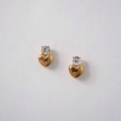 These chic and elegant heart earrings with a cubic zirconia stone are perfect for adding a touch of love and glamour to any outfit.  -stainless steel, gold plated Chic And Elegant, Heart Studs, Jewelry Case, Heart Earrings, Pearl Jewelry, Shop Necklaces, Ring Earrings, Of Love, Etsy Earrings