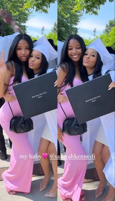 four beautiful young women dressed in pink posing for the camera with one holding a laptop