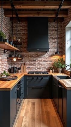 a kitchen with brick walls and wooden floors is pictured in this image, there are shelves on either side of the stove