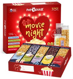 pop n'doulee movie night with popcorn and snacks in front of it