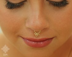 14K SOLID GOLD delicate flower septum hoop earring. Perfect as body piercing too. ---> Features: ♦ Material: 14k SOLID GOLD yellow ♦ Tiny flower size: length: 7.9 mm width: 5mm Select your preference in the gauge / diameter at the top right of this page. ♦ Gauge: wire hoop thickness: Select your preference in the gauge at the top right of this page. *Gauge: the thickness of the wire the smaller the gauge the thicker the earring shaft is. 16 gauge - 12 mm ( 18 gauge - 10 mm 20 gauge - 8 mm 22 Dainty Internally Threaded Nose Rings For Wedding, Dainty Hypoallergenic Nose Rings For Wedding, Elegant Pierced Septum Ring For Wedding, Elegant Septum Ring For Wedding, Nickel-free Hoop Septum Ring For Wedding, Nickel Free Hoop Septum Ring For Wedding, Gold Hypoallergenic Nose Rings For Wedding, Tiny Gold Nose Rings For Wedding, Minimalist Gold Septum Ring For Wedding