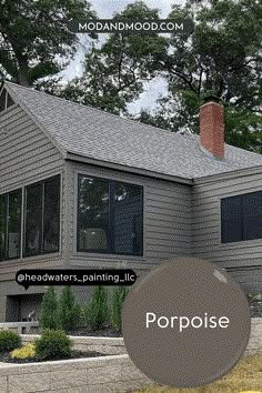 a gray house with the words poppise on it's front and side