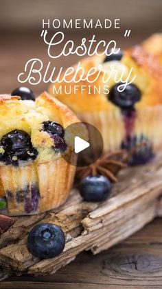 blueberry muffins on a wooden board with the words homemade, casto blueberry muffins