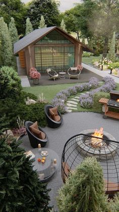 an aerial view of a backyard with fire pit and seating area, surrounded by trees