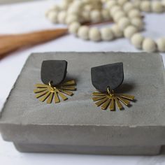 Introducing our exquisite black clay earrings, the perfect accessory to complement your wedding day ensemble with timeless elegance. Crafted with utmost care and attention to detail, these stunning earrings feature a soft, neutral hue that effortlessly blends with any wedding theme and attire. The earring posts are 18k gold plated copper wire and the total earring length is 1.25 inches. Hypoallergenic - Nickel Free - Tarnish Resistant Each item in our shop is carefully handcrafted with love and Black Matte Finish Jewelry Gift, Handmade Black Wedding Earrings, Delicate Bridal Earrings, Black Clay Earrings, Earrings For Wedding, Resin Clay, Lace Earrings, Black Clay, Earring Posts