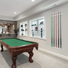 a pool table in the middle of a room