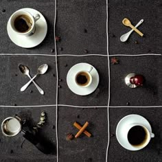 two cups of coffee and spoons on a checkered tablecloth with cinnamon sticks