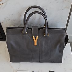 Barely Worn In Excellent Condition! Still Have The Original Tags. The Color Is More Like Dr. Gray. - Dimensions: 15.5w X 11.5 L X 7.5 D I Need To Look For The Dust Bag So Pls Message Me If You Need One. Ysl Cabas Bag, Bags Ysl, Black Leather Tote Bag, Yves Saint Laurent Bags, Black Leather Tote, Tote Bag Purse, Leather Tote Bag, Womens Tote Bags, Large Black