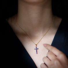 Product Details The Holy Charm Jesus Christ Cross Pendant is perfect for every occasion. It is embellished with Round Shape Blue Sapphire with a prong setting in Gold. Cross Locket is related to Jesus Christ. This Minimal Stackable Charm Necklace can be carried by any gender and age group person who strongly believes in God. A trend lover also adorns the same as a fashion. Product Information SKU SHP-PENDANT112027248 Length 26.5 mm Width 11.2 mm Weight 2.64 gm (Approximate) BLUE SAPPHIRE INFORMA Cross Locket, Jesus Christ Cross, Christ Cross, Blue Sapphire Necklace, The Cross Of Christ, Signature Jewelry, Timeless Jewelry, Gold Cross, Conflict Free Diamonds