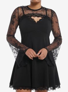 Slip into something classy for your LBD look! This twofer piece features a cami dress with black lace details and an empire waist  plus a lacy black cropped bolero shrug that has bell sleeves and a keyhole opening on the neck.95% polyester; 5% spandexWash cold; dry lowLength: 33"Adjustable strapsImportedListed in junior sizesModel is 5'9"Model wears size Small Shrug Sleeves, Cosmic Aura, Cutesy Outfit, Black Bell Sleeve Dress, Cami Slip Dress, Bolero Shrug, Midsize Fashion, Fun Toys, Dress Halloween Costume