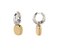 With their modern movement and combination of metals, these Kloto earrings are unlike anything in your collection. The polished sterling silver hoops sit right under the ear and attach to sterling silver latch backs. A rectangular, polished 18K yellow gold drop dangles below for a hint of unexpected movement and warmth. total length : 1 1/16"sterling silver hoop width : 3mm to 5.5mm18K yellow gold drops : 1/2" x 3/8"sterling silver latch backs Modern Shiny Huggie Earrings, Modern White Gold Tarnish Resistant Earrings, Modern White Gold Tarnish-resistant Earrings, Modern Small Hoop Plated Earrings, Modern Small Hoop Earrings With Plating, Modern Shiny Huggie Earrings As Gift, Modern Huggie Earrings With Shiny Finish As Gift, Modern Sterling Silver Huggie Earrings With Shiny Finish, Modern Yellow Gold Dangle Huggie Earrings