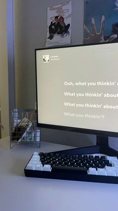 a computer keyboard sitting on top of a desk next to a mouse and monitor screen