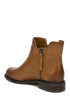 The Halford is a classic leather boot with moto-inspired exposed zippers for that on-trend look that lasts. Sizing: True to size. M=standard width. Round toe. Topstitched welt. Dual shaft zip closures. Lightly cushioned footbed. Low block heel. Approx. 5.25" shaft height, 9" opening circumference. Approx. 1" heel. Imported Workwear Moto Boots With Zipper Closure And Round Toe, Classic Ankle Boots With Zipper Closure, Brown Ankle Moto Boots With Zipper, Leather Boots With Zipper Closure For Work, Classic Workwear Boots With Zipper Closure, Leather Ankle-high Boots With Zipper, Leather Ankle-high Boots With Zipper Closure, Brown Ankle-high Moto Boots With Zipper, Brown Ankle-high Moto Boots With Zipper Closure